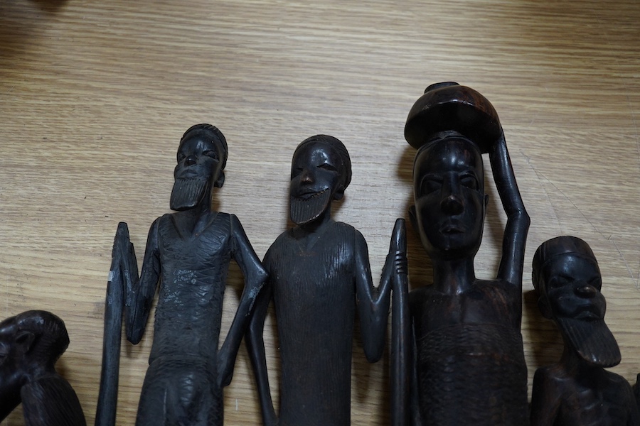 Six African tribal carved wood figures, tallest 48cm high. Condition - good